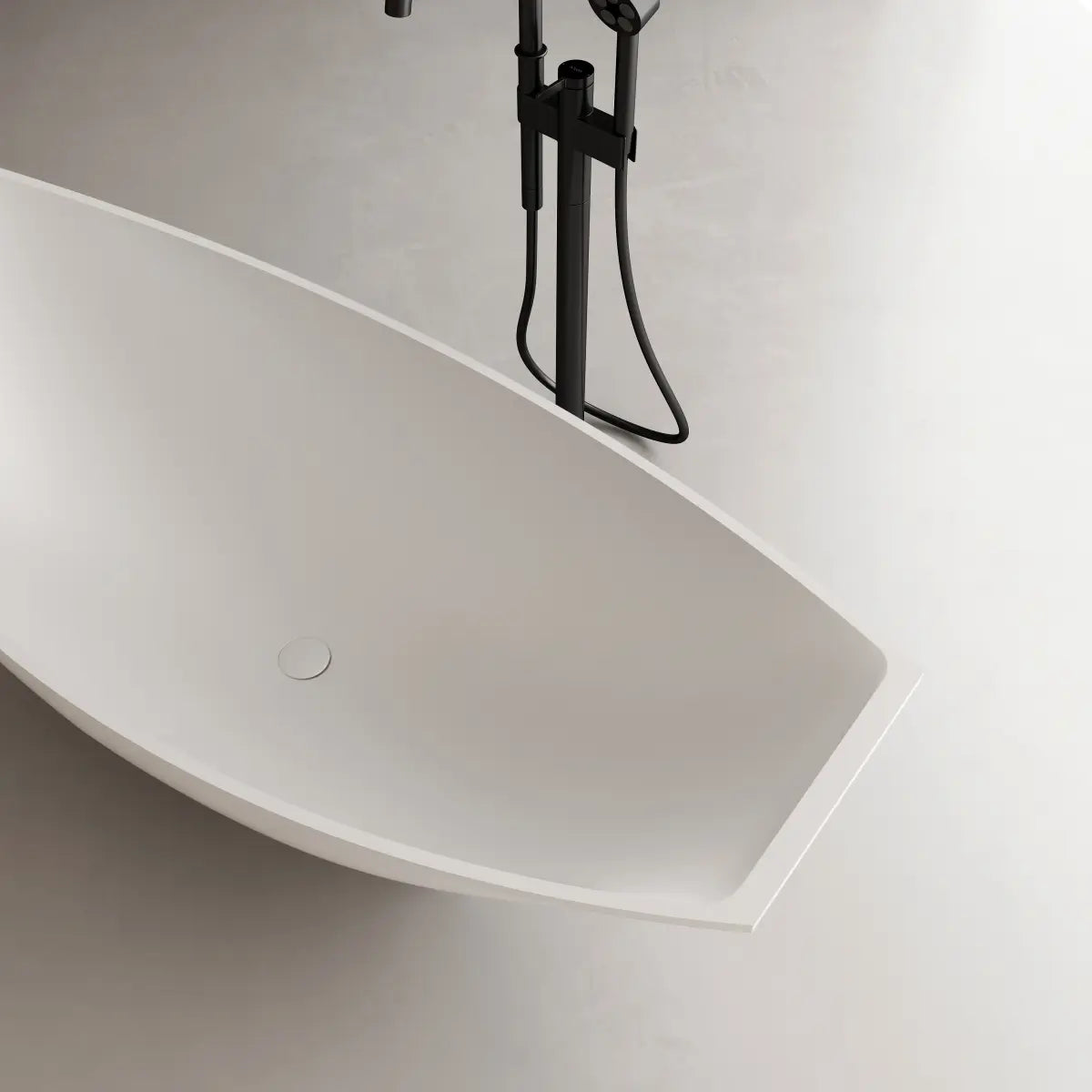 Elegant solid surface freestanding bath with deep soaking comfort and smooth finish