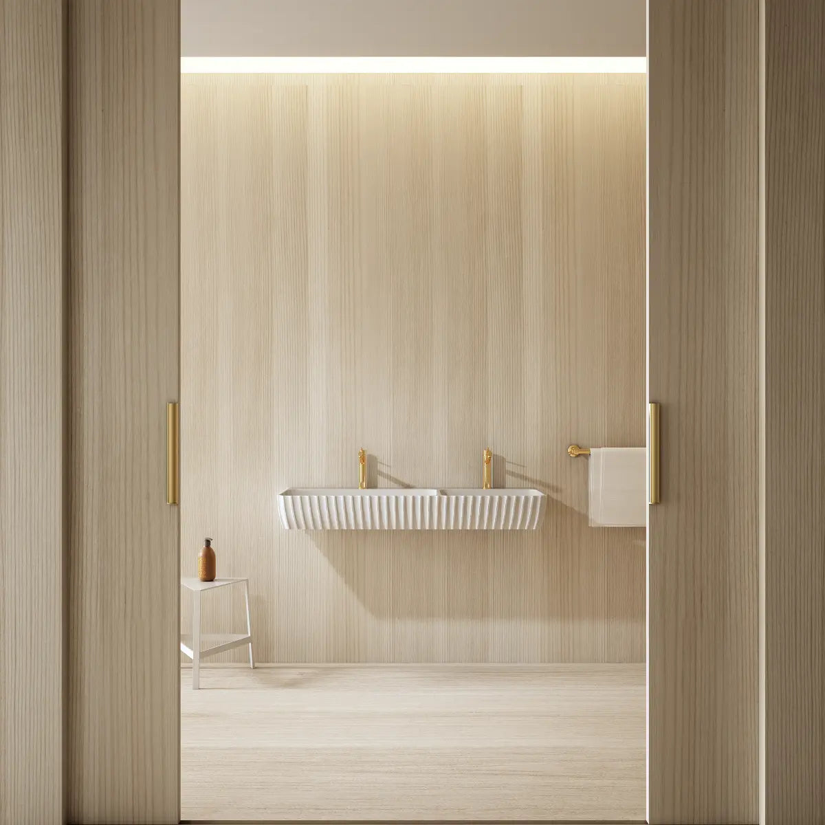 Modern white bathroom double sink fixture with seamless edges and architectural styling
