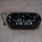 HALO Series black marble soaking bathtub with transparent acrylic detail