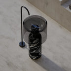 MonBlari BvIgari black freestanding pedestal basin with artistic design