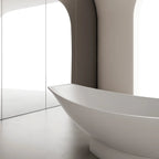 Minimalist hammock style solid surface bathtub for luxury modern bathroom spaces