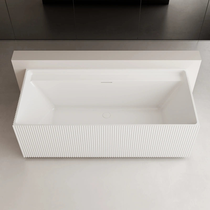 Luxury glossy white rectangular bathtub with fluted exterior for modern bathrooms