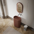 Modern sculptural bathroom pedestal sink side top view close-up