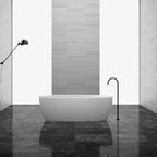 Solid surface freestanding bathtub in matte white for modern bathrooms