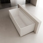 Contemporary rectangular acrylic bathtub with hidden overflow and fluted side panels