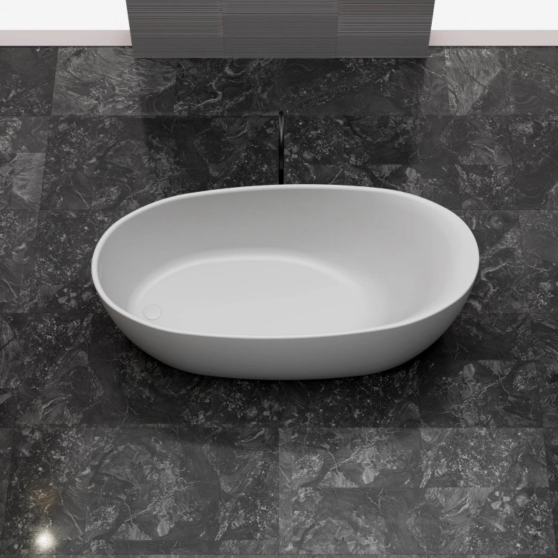 Solid surface soaking tub with minimalist oval shape