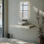 Solid surface bathroom sink with flowing ruffle design