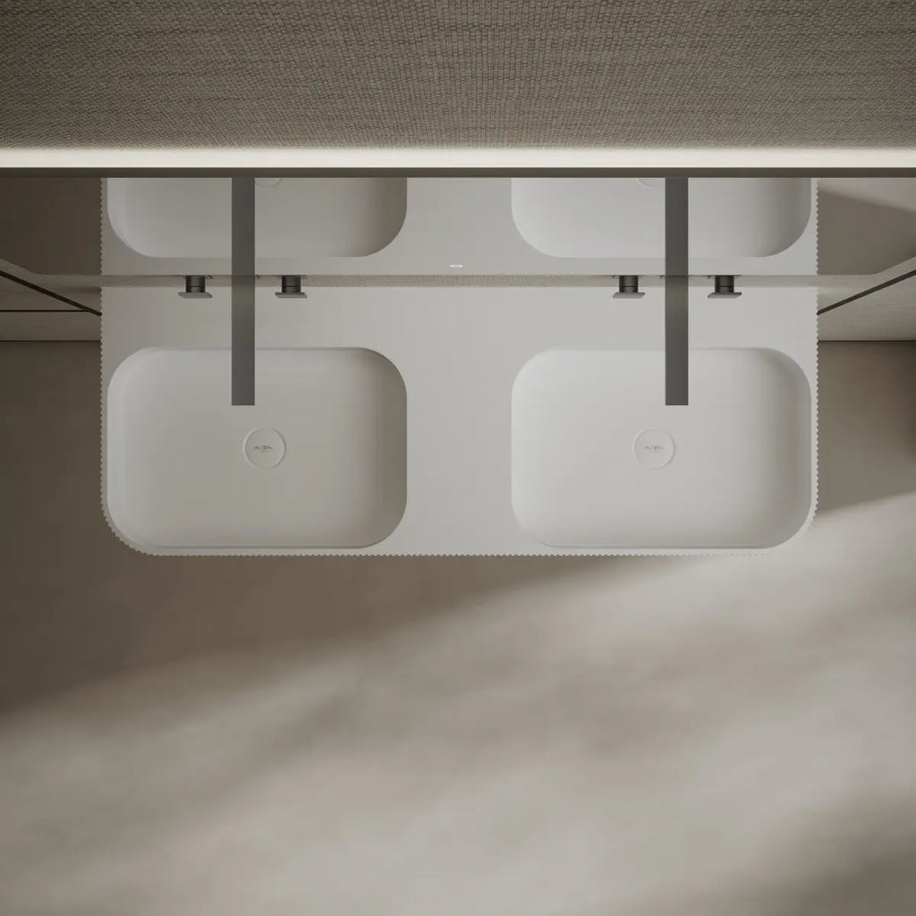 Wall hung double sink with spacious countertop area and integrated basins