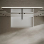Modern white wall mount wash basin with rectangular design and seamless finish