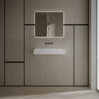 Modern white wall-hung wash basin featuring a spacious rectangular design and seamless finish
