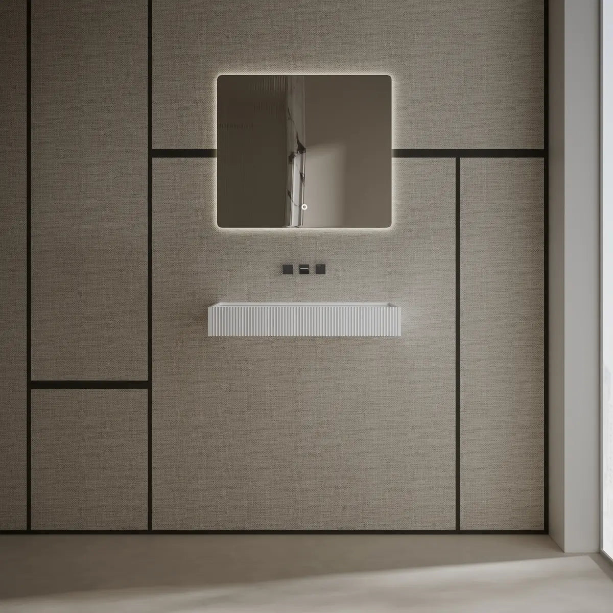 Modern white wall-hung wash basin featuring a spacious rectangular design and seamless finish