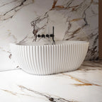 Acrylic back-to-wall soaking bathtub with fluted design