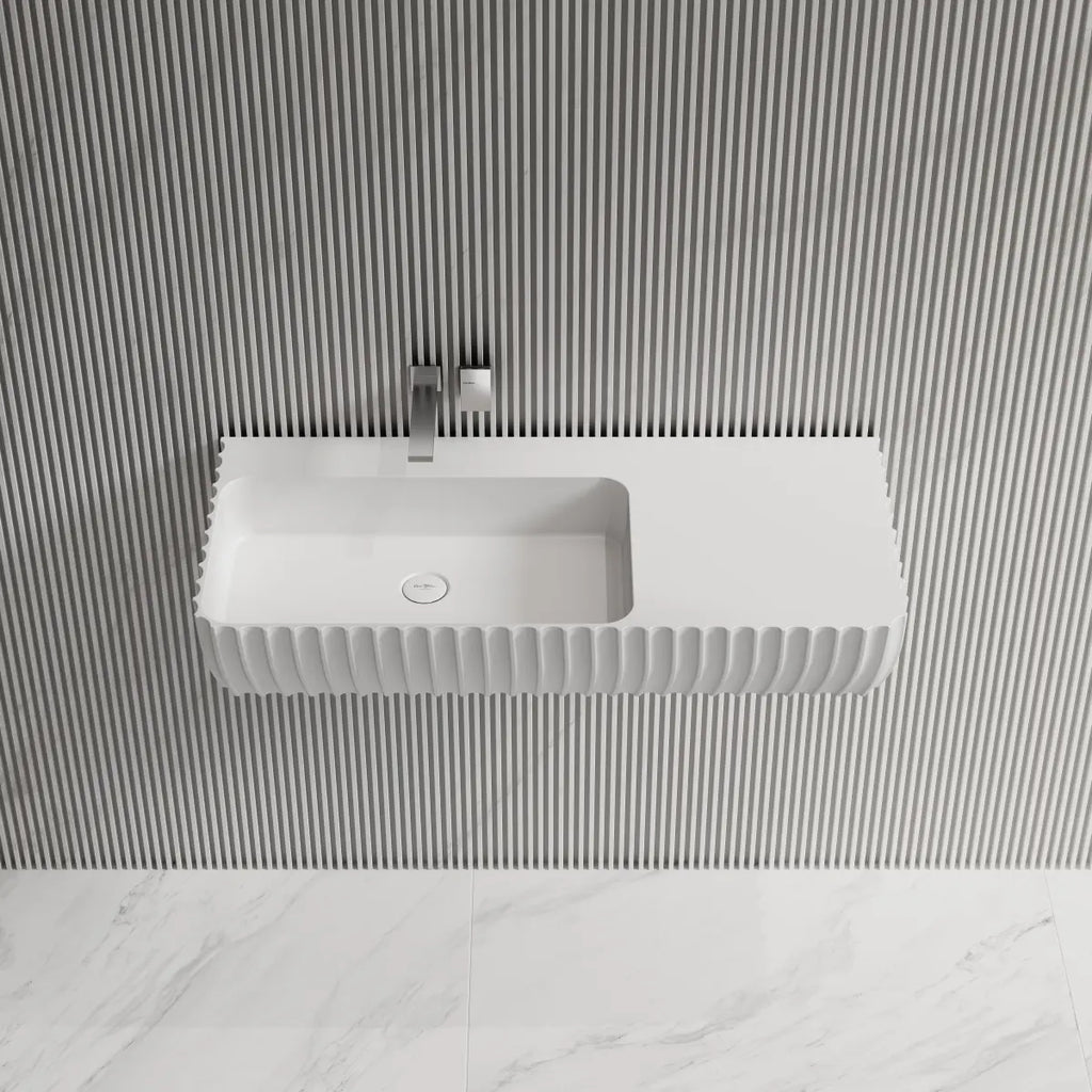 Wall hung sink with spacious area and integrated basins fluted design