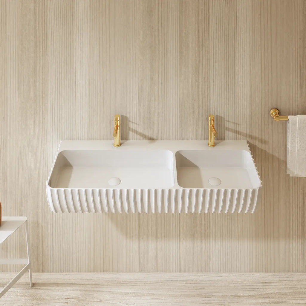 Contemporary white double wash basin with a clean geometric silhouette and wall-mounted installation