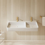 Contemporary white double wash basin with a clean geometric silhouette and wall-mounted installation